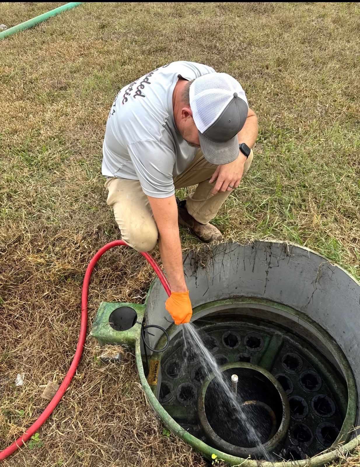 Bonded Septic Tank technician pumping out a septic tank in Citrus County, Florida